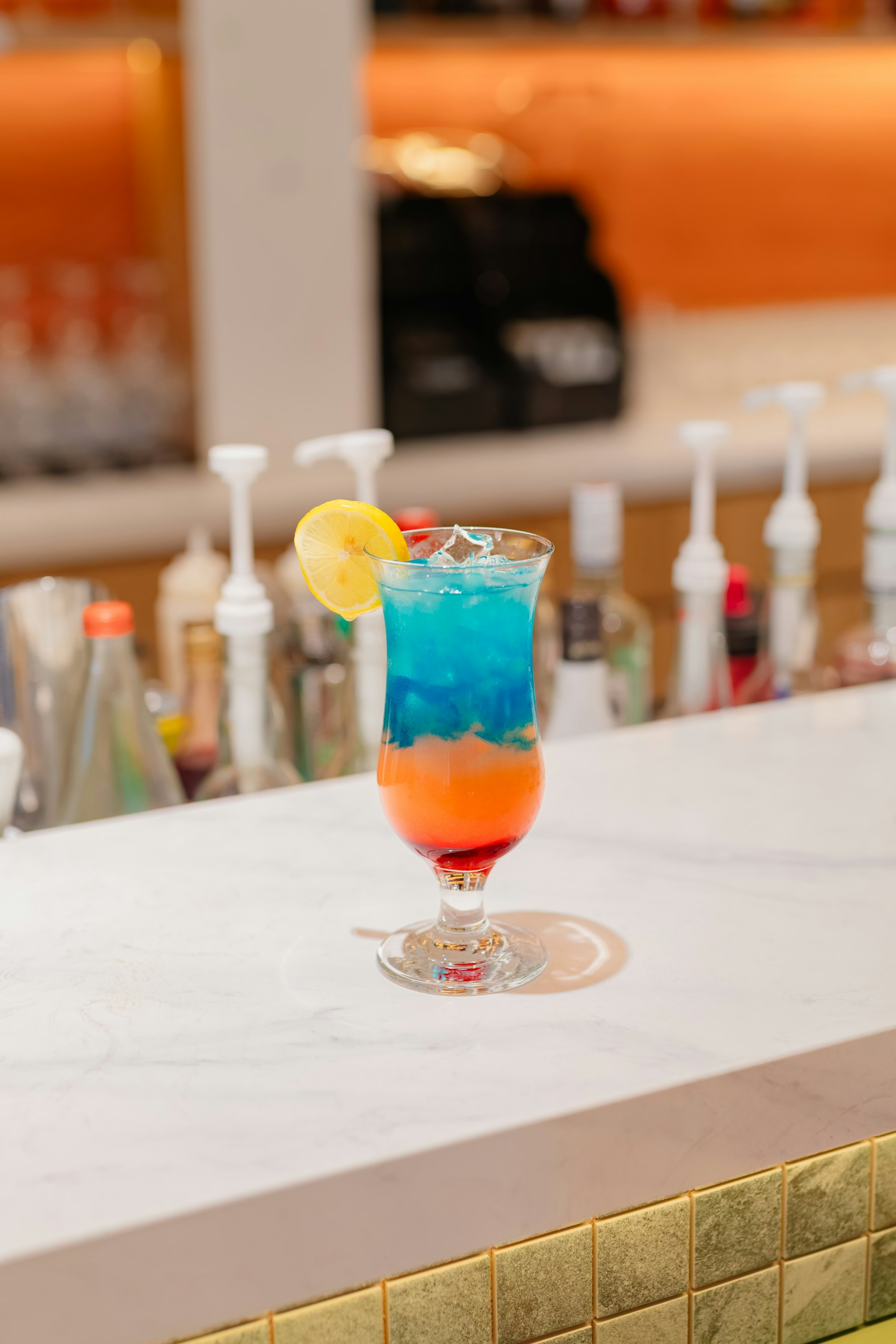 Cocktail on a bar for NYC bottle service minimum spend guide